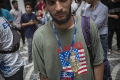 NPDL01JUL2822. An Iranian athlete wears a badge card as he waits to participate in a Parkour Speed Run competition in a shopping mall which is currently under constructions in northwestern Tehran on July 28, 2022.