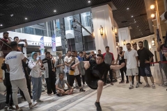 NPDL09JUL2822. An Iranian athlete demonstrates his Parkour skills as he waits to participate in a Parkour Speed Run competition in a shopping mall which is currently under constructions in northwestern Tehran on July 28, 2022.