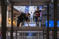 NPDL16JUL2822. Two Iranian athletes compete during a Parkour Speed Run competition in a shopping mall which is currently under constructions in northwestern Tehran on July 28, 2022.