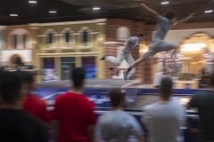 NPDL18JUL2822. Two Iranian athletes compete during a Parkour Speed Run competition in a shopping mall which is currently under constructions in northwestern Tehran on July 28, 2022.