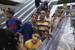 NPDL19JUL2822. An Iranian family and other Parkour enthusiasts watch a Parkour Speed Run competition in a shopping mall which is currently under constructions in northwestern Tehran on July 28, 2022.