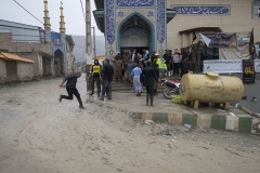 NPNW06AUG0122. Volunteers take shelter at a mosque as flooding after a sudden heavy rain in the flooded village of Mazdaran in Firoozkooh county 124 km (77 miles) northeast of Tehran, August 1, 2022.